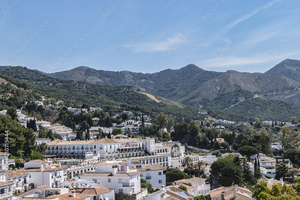 Obraz premium Beautiful aerial view of Mijas - Spanish hill town overlooking the Costa del Sol, not far from Malaga. Mijas known for its white-washed buildings. Mijas, Andalusia, Spain.
