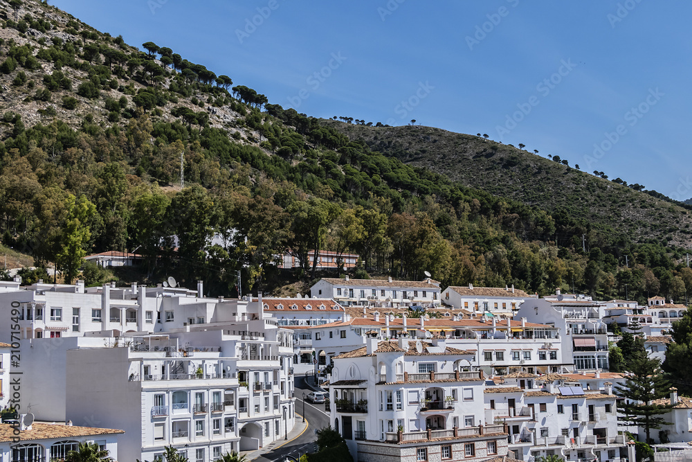 Obraz premium Beautiful aerial view of Mijas - Spanish hill town overlooking the Costa del Sol, not far from Malaga. Mijas known for its white-washed buildings. Mijas, Andalusia, Spain.
