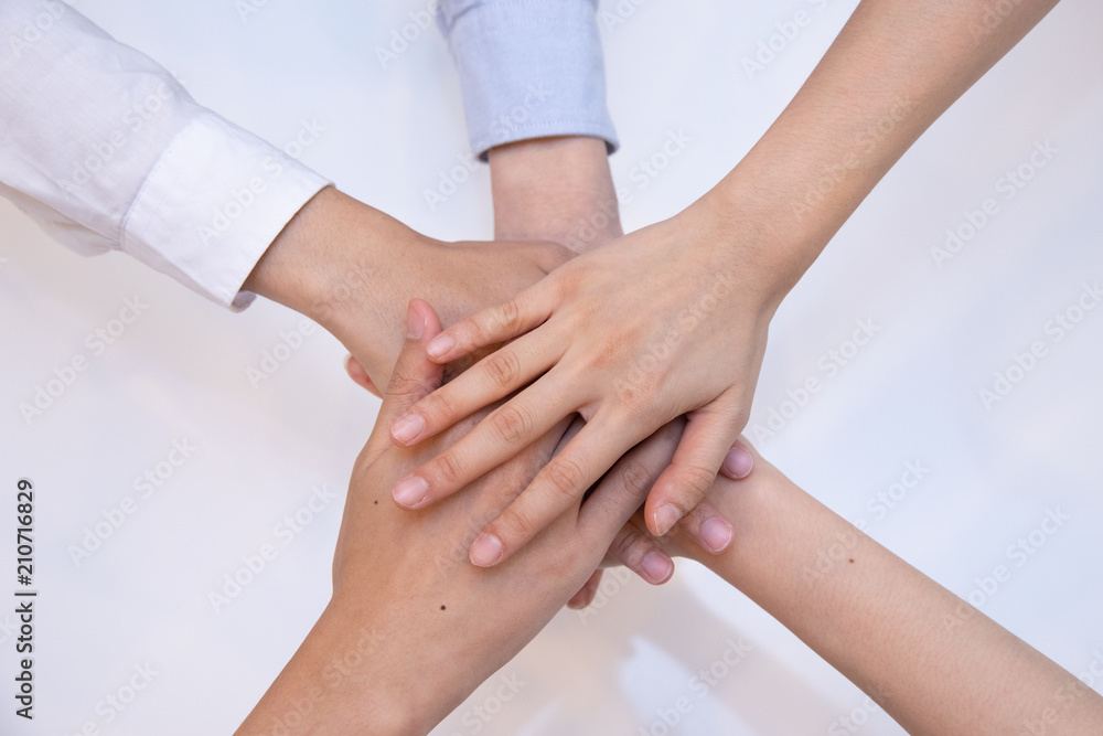 Business people join their hand together in teamwork concept Business people join their hand together in teamwork concept
