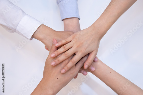 Business people join their hand together in teamwork concept