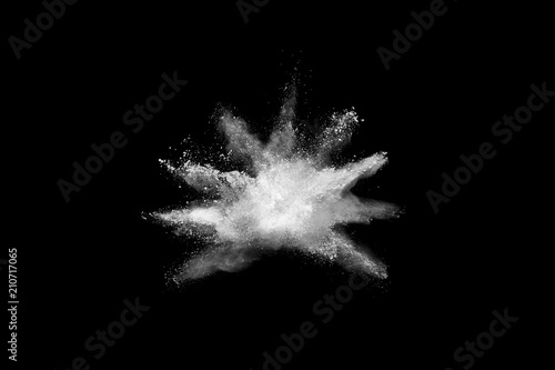 Launched white powder, isolated on black background.