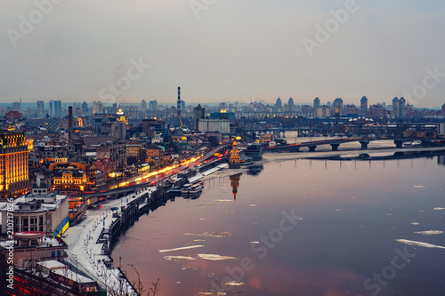 Aerial view of Podol and Dnipro river in the evening in Kyiv, Ukraine
