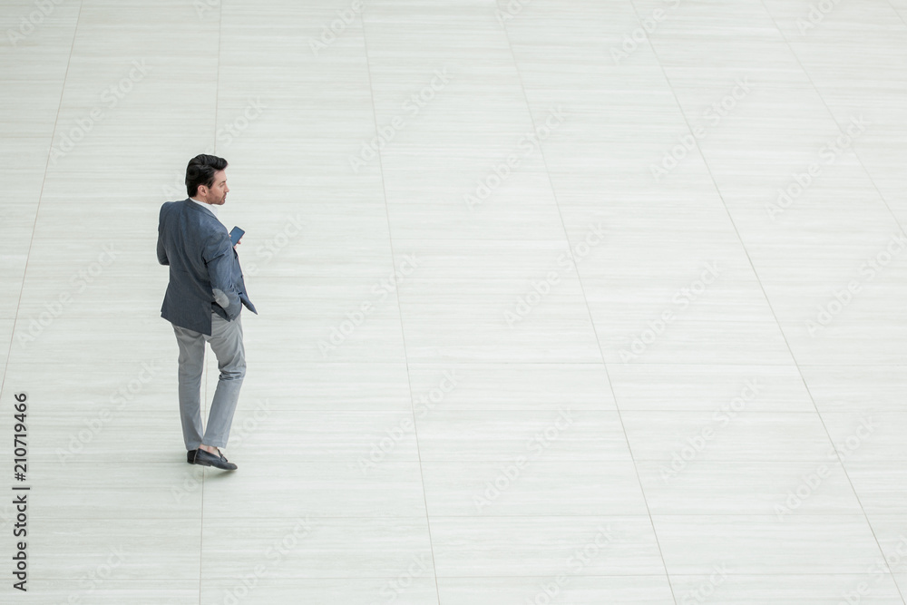 top view from far away.businessman with smartphone top view from far away.businessman with smartphone