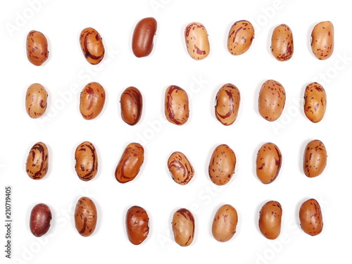 Set raw brown beans isolated on white background, top view