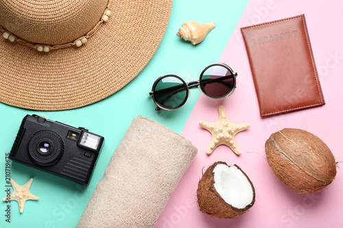 Coconuts with summer accessories and retro camera