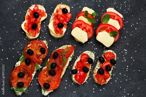Italian brochettes tomatoes black olives Flat lay natural healthy vegetarian food