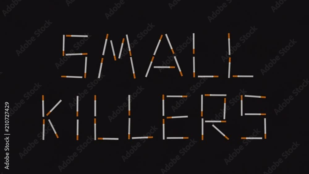 Small killers words made of moving cigarettes. No smoking concept in stop motion animation Small killers words made of moving cigarettes. No smoking concept in stop motion animation