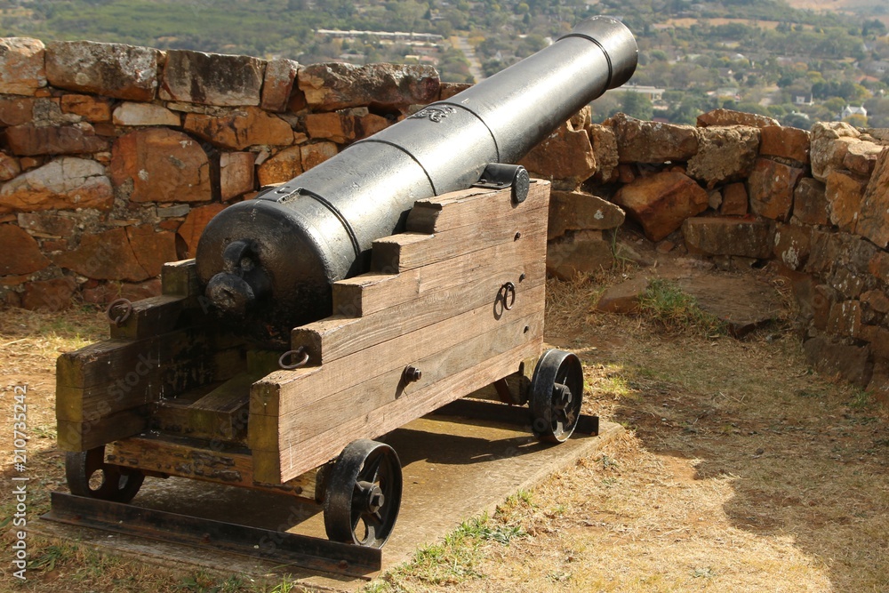 An old cast iron cannon at Fort Selwyn in Grahamstown, South Africa. An old cast iron cannon at Fort Selwyn in Grahamstown, South Africa.