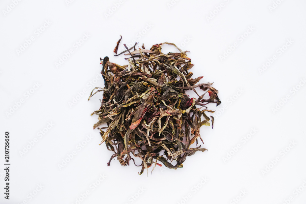 Loose Leaf Raw Sheng Puer from Badashan mountain, Lincang, China, spring 2018 on white background Loose Leaf Raw Sheng Puer from Badashan mountain, Lincang, China, spring 2018 on white background