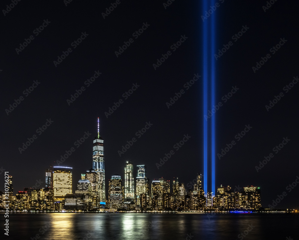 Obraz premium Tribute light memorial event on 11th of September in New York City, Manhattan at Ground Zero World Trade Center