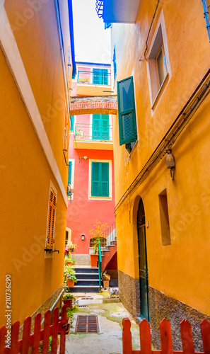 Colorful buildings in Monterosso in Cinque Terre, Italy on an overcast day. photo