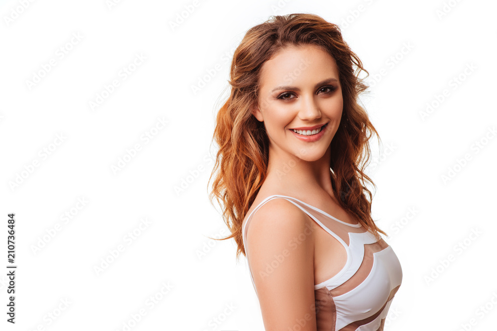 Fit and sporty girl in white swimsuit. Fit and sporty girl in white swimsuit.