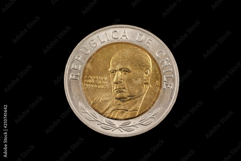 Close up of a Chilean bimettalic 500 peso coin isolated on a black background Close up of a Chilean bimettalic 500 peso coin isolated on a black background