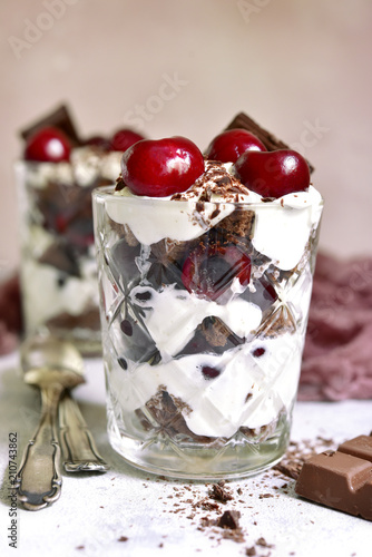 Layered dessert  Black forest  - chocolate biscuit whipped cream  cherry and rum or brendy.