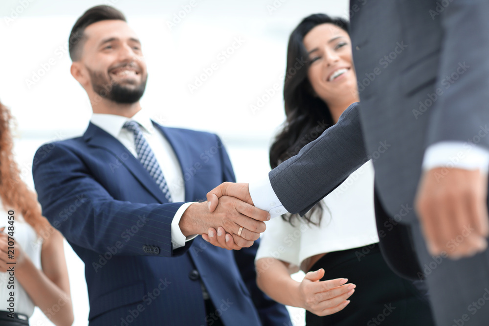 handshake business partners at a meeting handshake business partners at a meeting
