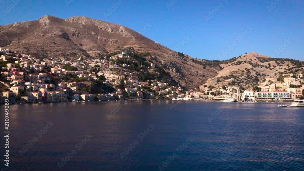 Symy island - Greece - August 2017 - View of Symi Island town by speedboat Symy island - Greece - August 2017 - View of Symi Island town by speedboat