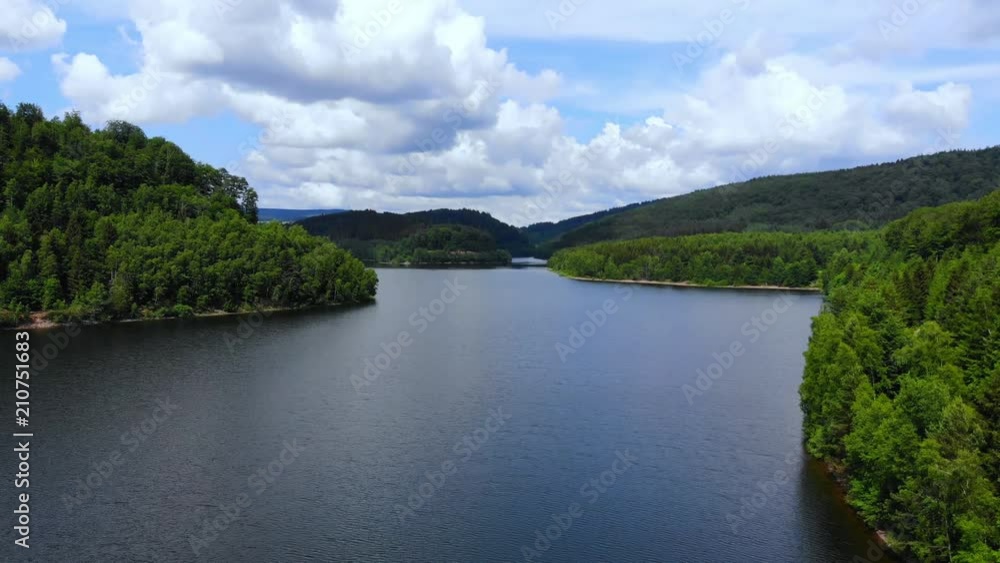 Big lake in the woods - aerial drone flight Big lake in the woods - aerial drone flight