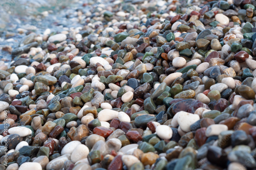 Sea pebbles on the shoreline, close-up
