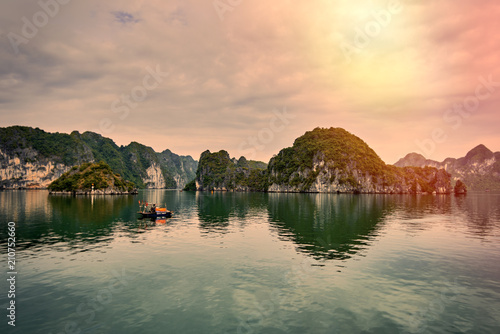 Halong bay boats, Vietnam Panoramic view of sunset in Halong Bay, Vietnam, Southeast Asia,UNESCO World Heritage Site