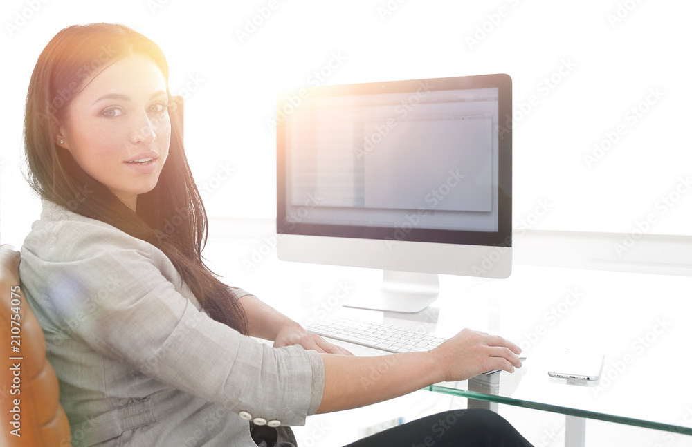 Young business woman working with computer data. Young business woman working with computer data.