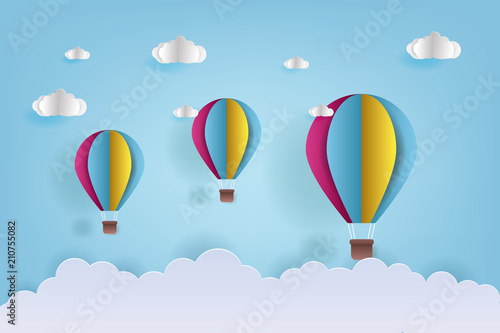 Fototapeta Naklejka Na Ścianę i Meble -  Vector Illustration Origami Colorful Hot Air Balloon and Cloud. paper art and craft style. Hot air balloon wallpaper.