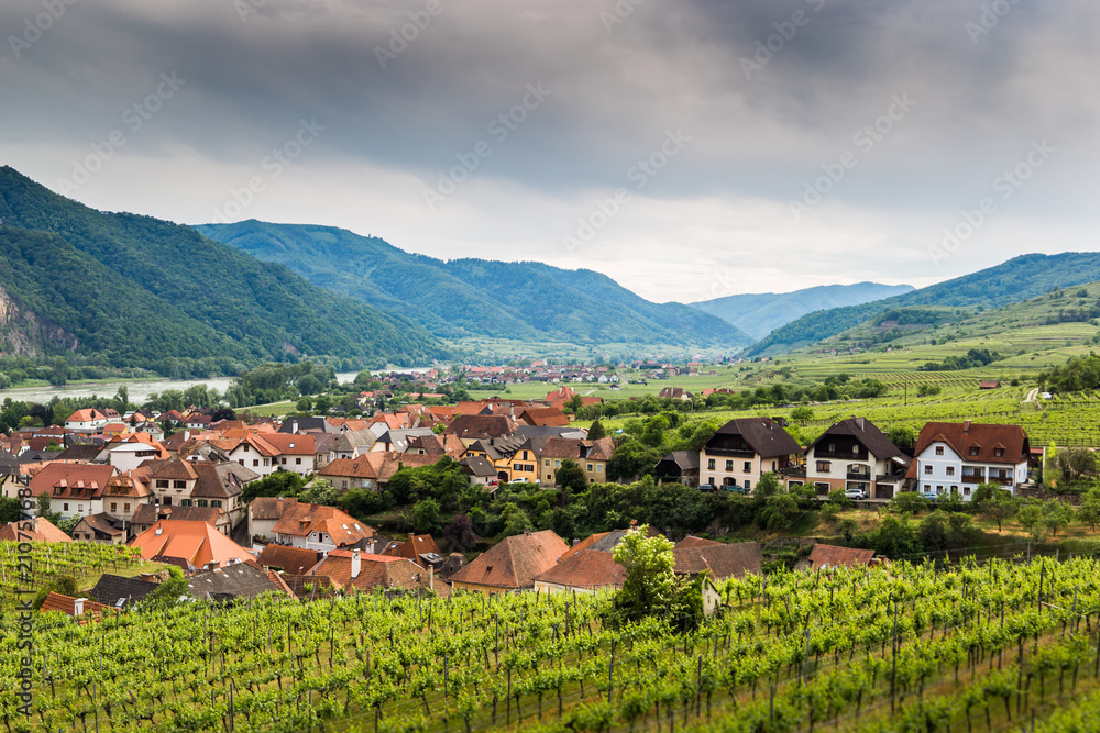 Scenic View into the Wachau with the river Danube and town Weissenkirchen in Lower Austria.