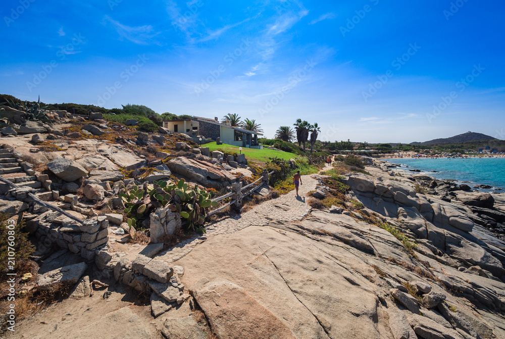Pedestrian path between the rocks along the sea of Sardinia. Pedestrian path between the rocks along the sea of Sardinia.