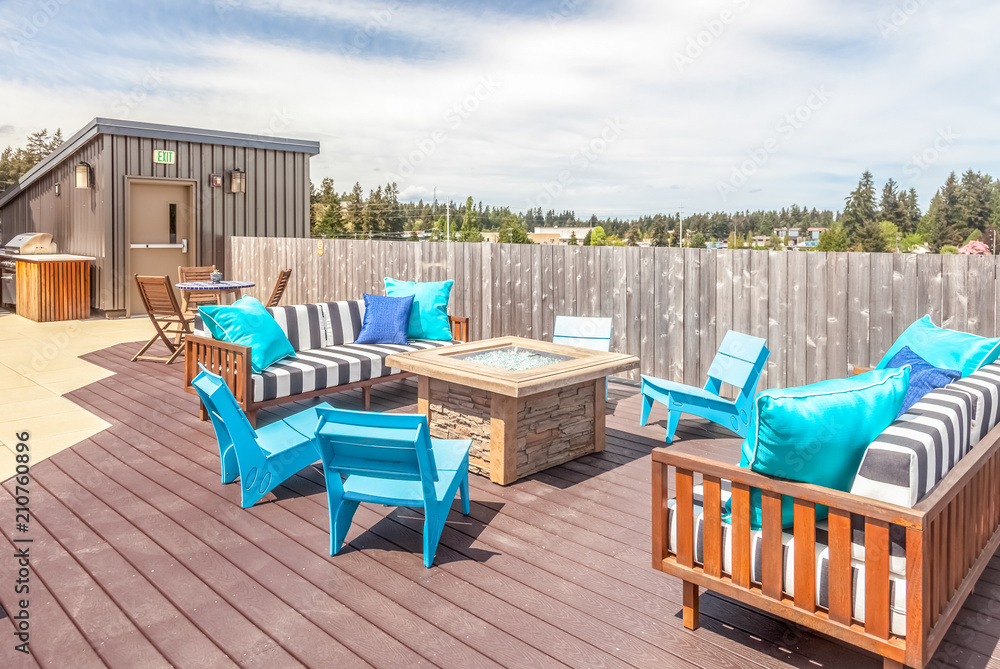 rooftop deck with modern blue patio furniture - obrazy, fototapety, plakaty 