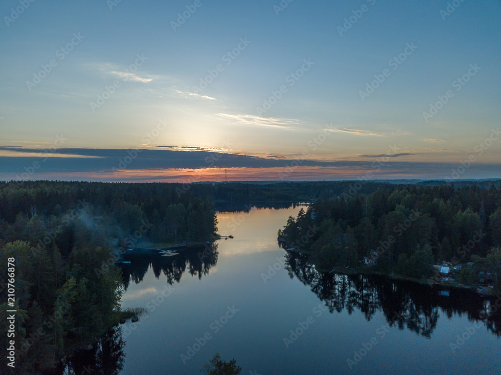 Fototapeta premium Evening view from the air to the system of lakes with islands 