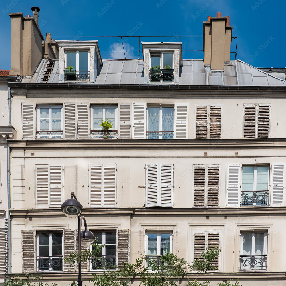 Fototapeta Paris, beautiful building, typical parisian facade near Republique neighborhood