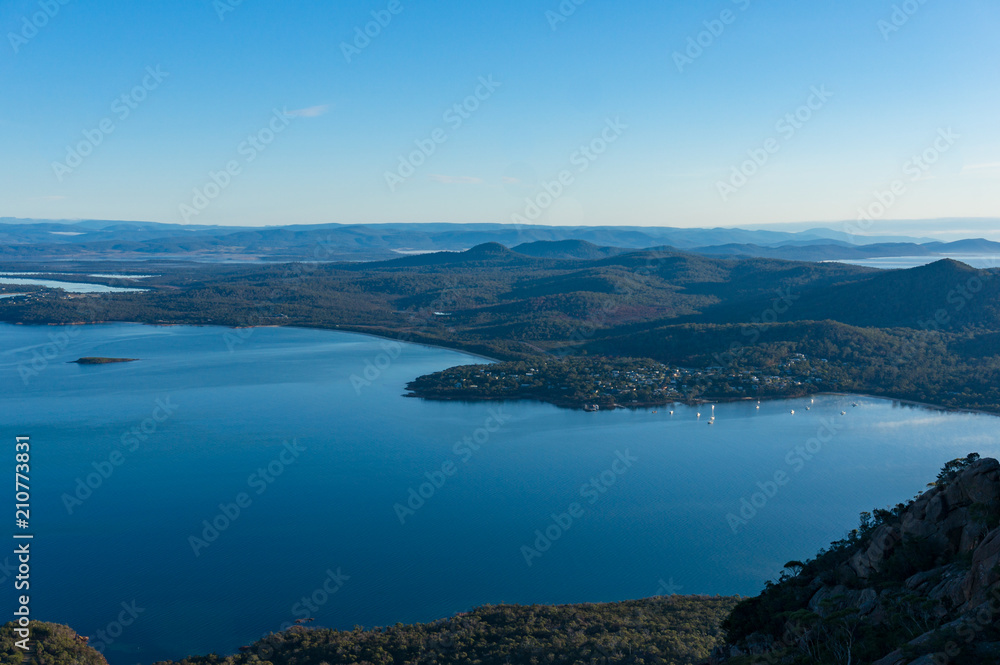 Aerial landscape of sea bay with mountains and forest