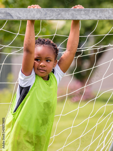 A young African girl is enjoying summertimes photo