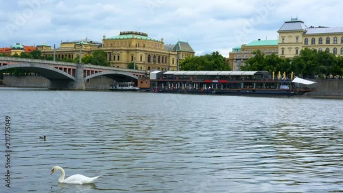 Wallpaper Mural Panning shot of Prague shores over Vltava River with marina waterfront restaurant Torontodigital.ca
