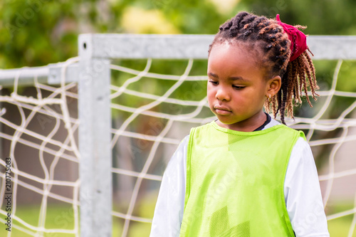 A young African girl is enjoying summertimes photo