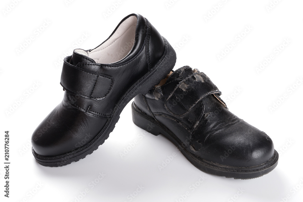 pair of brand new black leather shoe for children on white background pair of brand new black leather shoe for children on white background