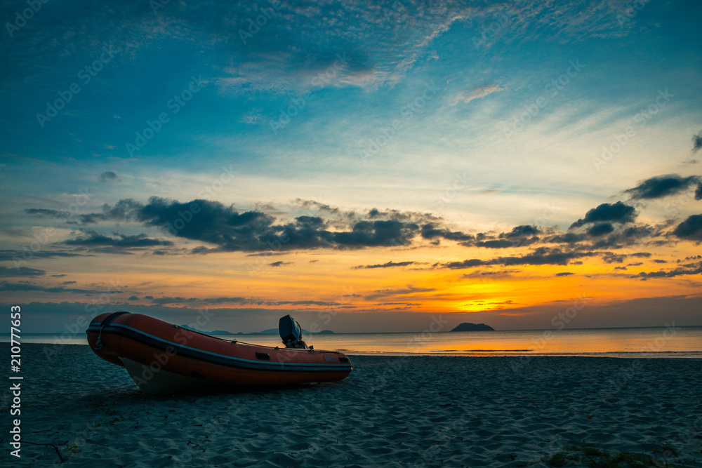 boat at sunrise on bang baen beach in Ranong boat at sunrise on bang baen beach in Ranong