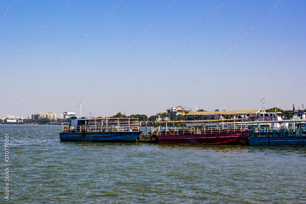 View of Boats Lined up at the Harbor at Hussain Sagar Lake in Hyderabad, India