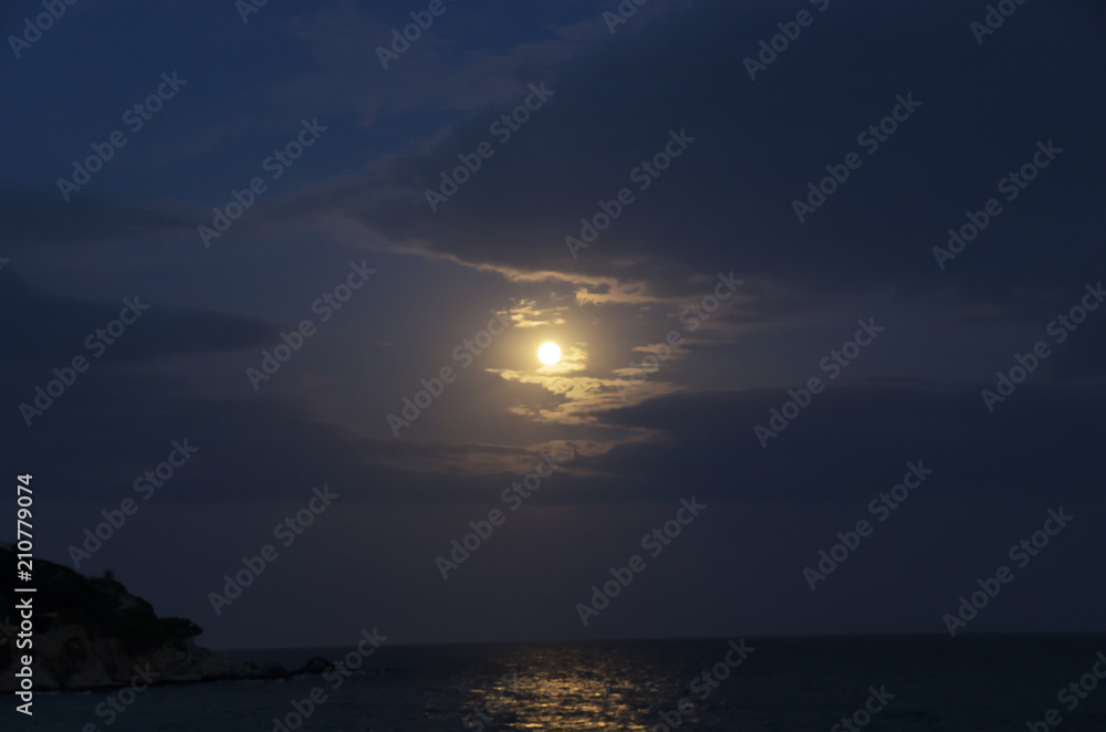 Night seascape with moon in the sky Night seascape with moon in the sky