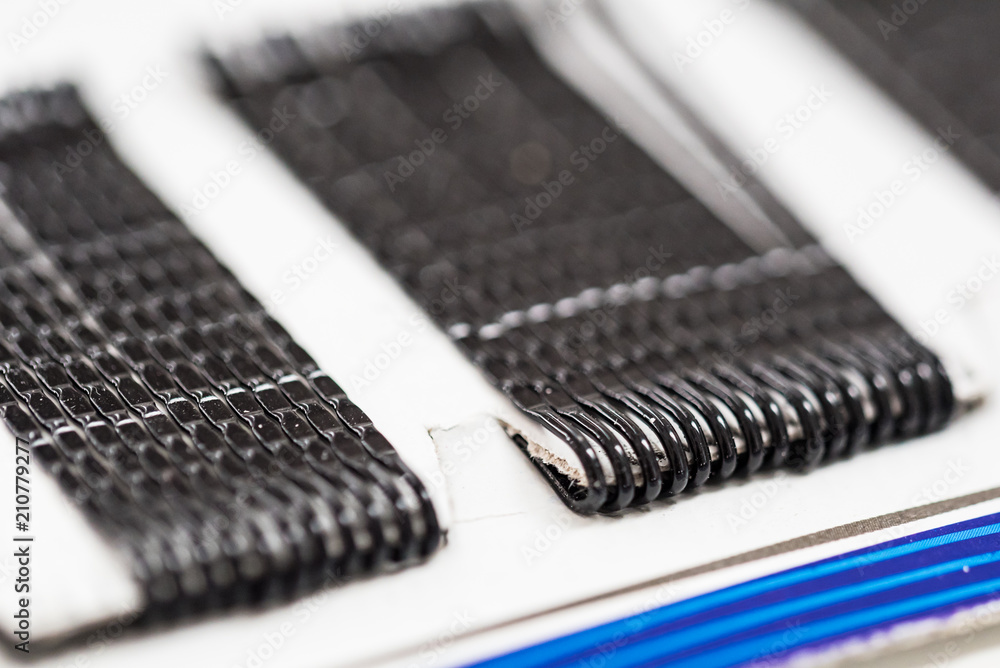 Black metal bobby pins for hair on paper Black metal bobby pins for hair on paper
