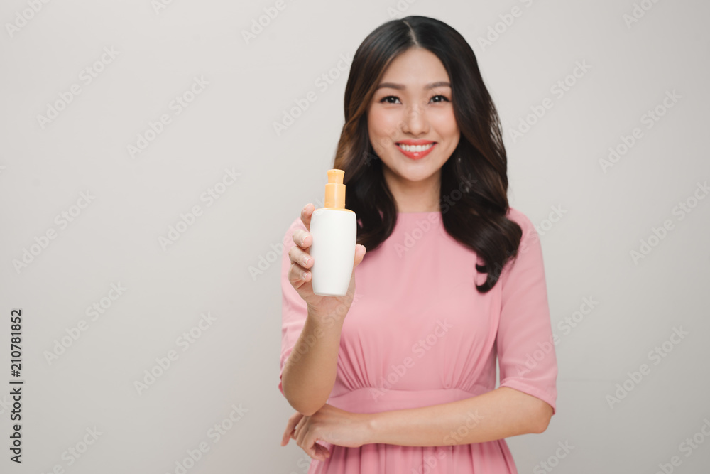 health and beauty concept - happy woman with skincare package health and beauty concept - happy woman with skincare package