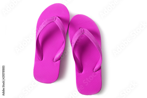 Vivid pink flipflops beach sandals isolated on white background