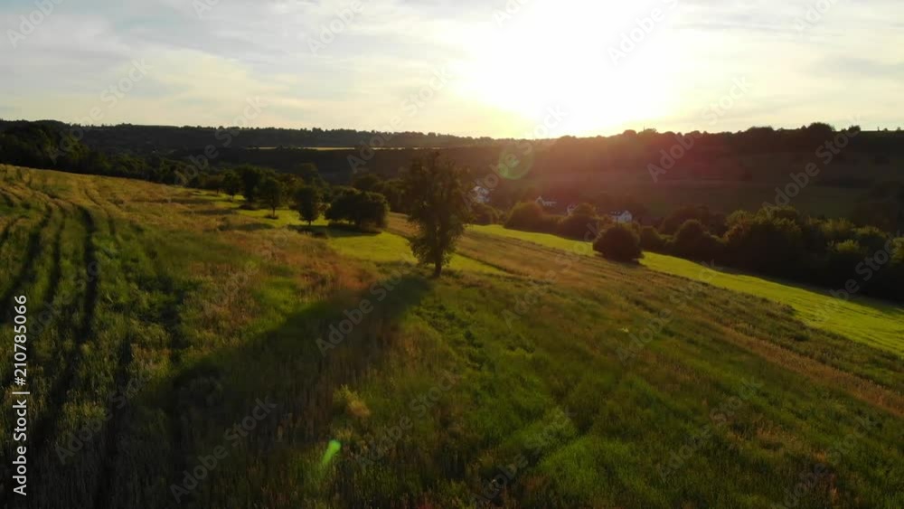 Flight over farmlands in the country - aerial drone footage Flight over farmlands in the country - aerial drone footage
