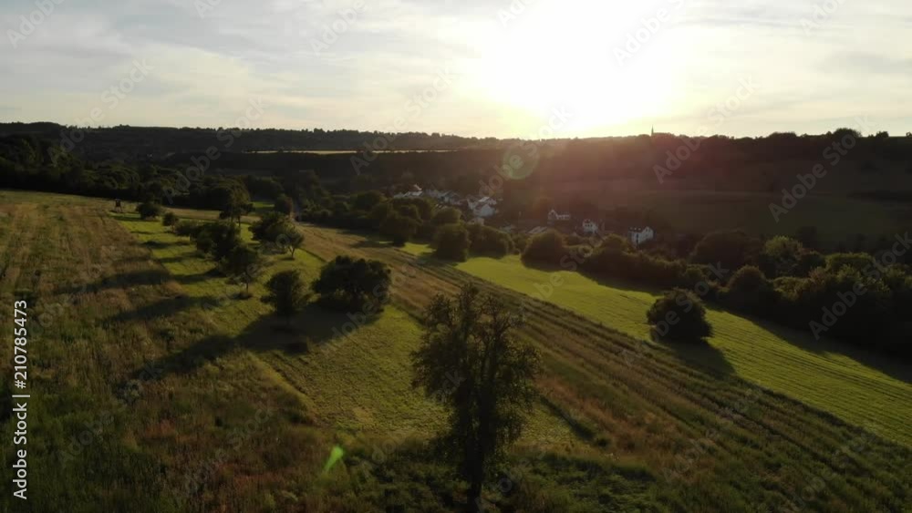 Flight over farmlands in the country - aerial drone footage Flight over farmlands in the country - aerial drone footage