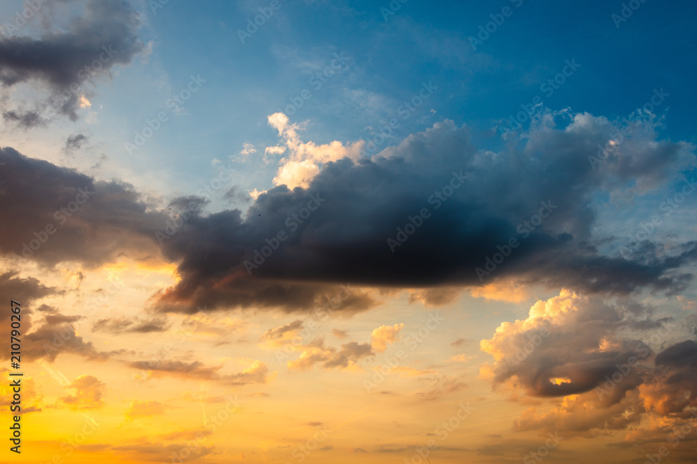 Clouds in the sky at sunset as background