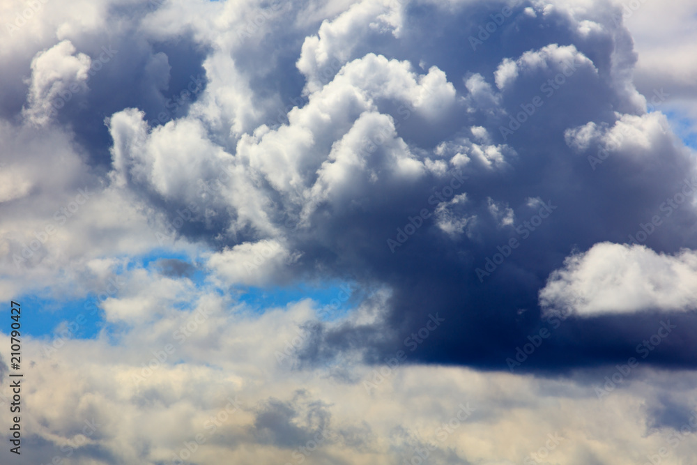 Clouds on a blue sky as a background Clouds on a blue sky as a background