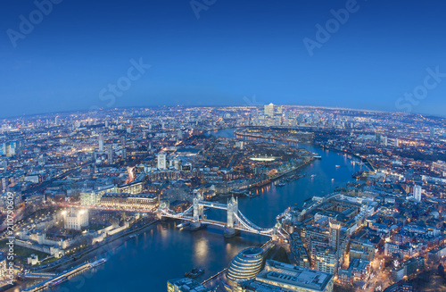 wide view of London city in a beautiful night. aerial shot © Ioan Panaite