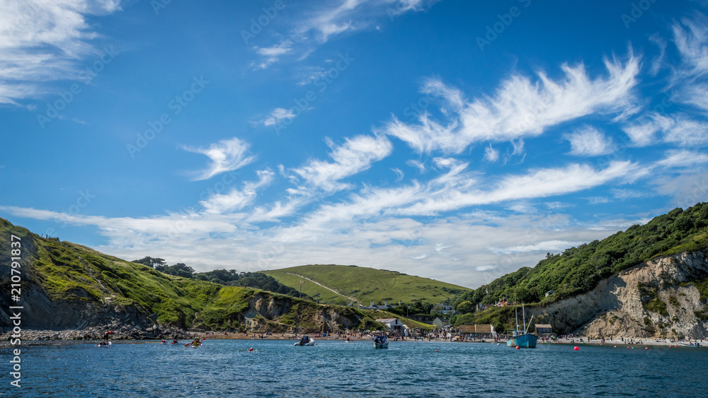Obraz premium Boats moored in Lulworth Cove on Dorset coast