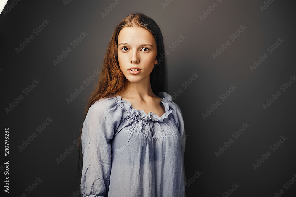 Close up portrait red-haired girl natural make-up. Skin care, pretty baby face, studio portrait Close up portrait red-haired girl natural make-up. Skin care, pretty baby face, studio portrait