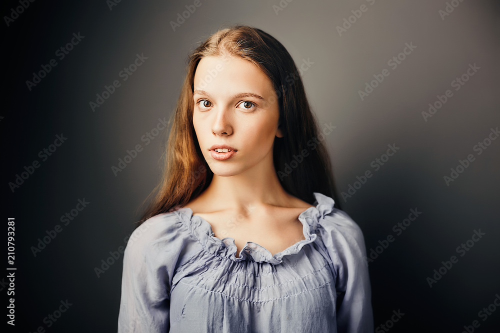 Close up portrait red-haired girl natural make-up. Skin care, pretty baby face, studio portrait Close up portrait red-haired girl natural make-up. Skin care, pretty baby face, studio portrait