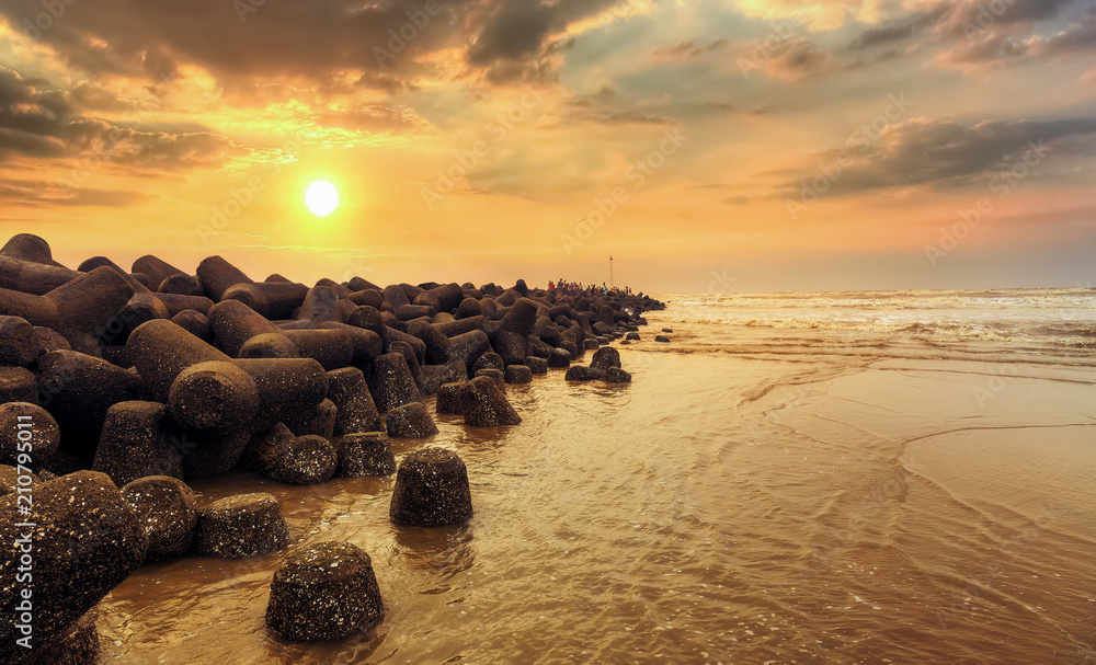 sunrise-at-rocky-sea-beach-at-digha-mohona-west-bengal-india-stock